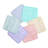 Flowers Slow Feeder Enrichment Bowls in assorted pastel colors designed to promote slow feeding and reduce anxiety in dogs.